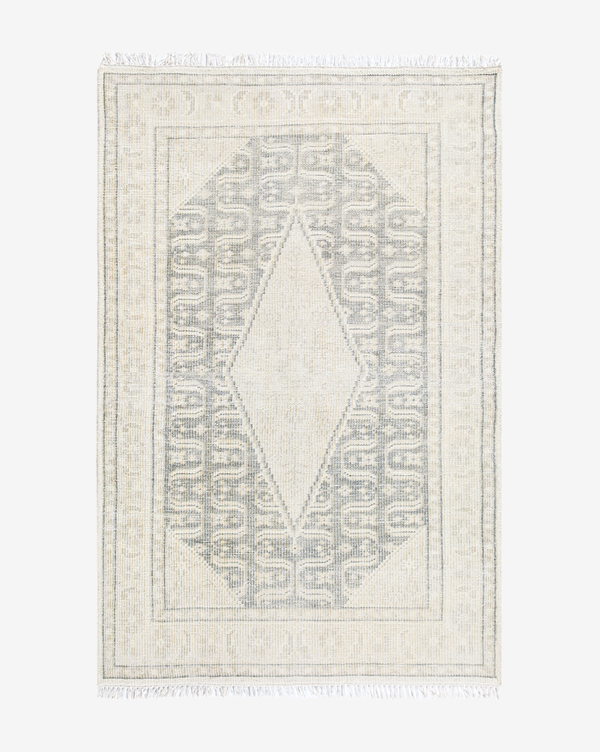 McGee & Co. hand-knotted rug with cream and blue tones