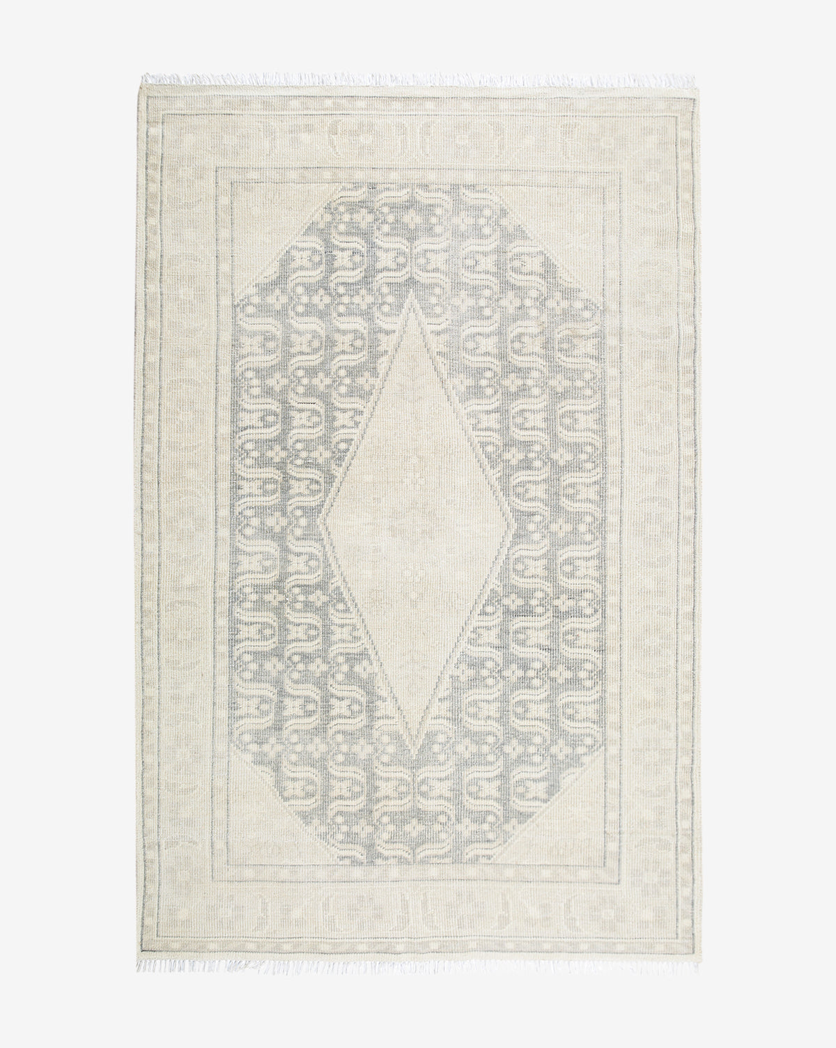 McGee & Co. hand-knotted rug with cream and blue tones