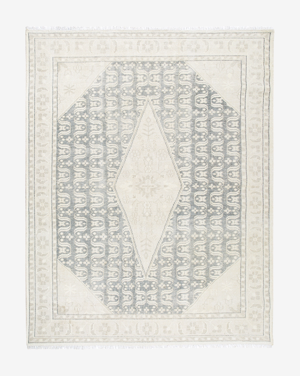 McGee & Co. hand-knotted rug with cream and blue tones