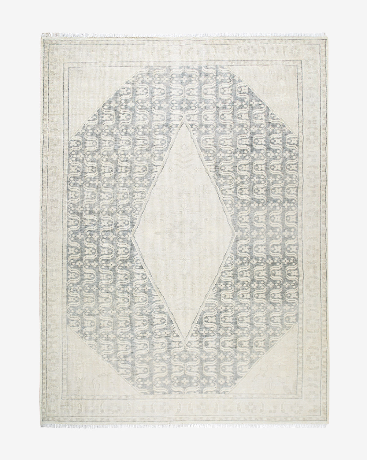 McGee & Co. hand-knotted rug with cream and blue tones