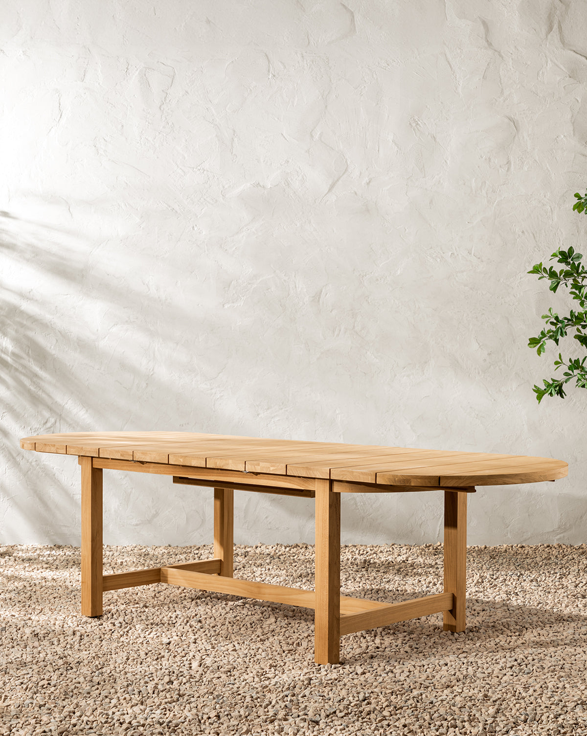 McGee & Co. teak wood outdoor dining table with extension.  