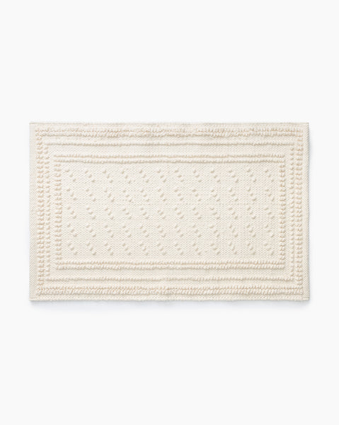 https://www.mcgeeandco.com/cdn/shop/files/LohmannBathMat-MBTH0339-CRM-OS-MAIN-T_grande.jpg?v=1689098007