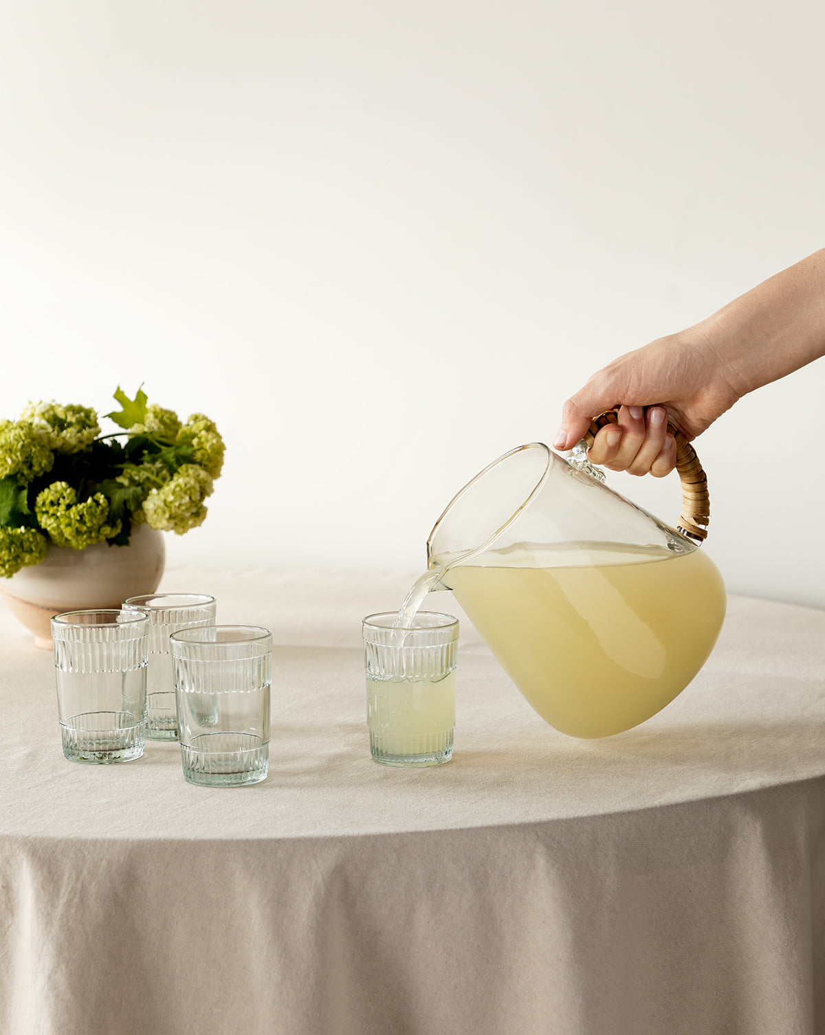 Wicker Handled Glass Pitcher